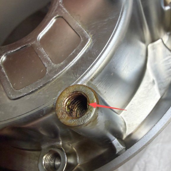 Threaded hole with plating contamination inside