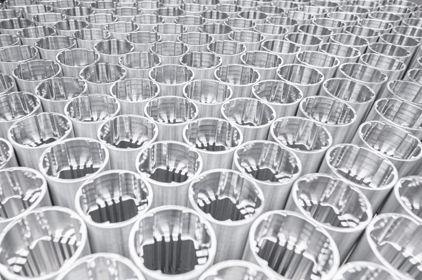 Rows of finished aluminium die-cast parts after production