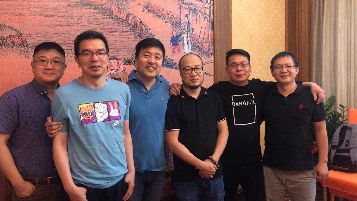 The same colleagues at a reunion years later